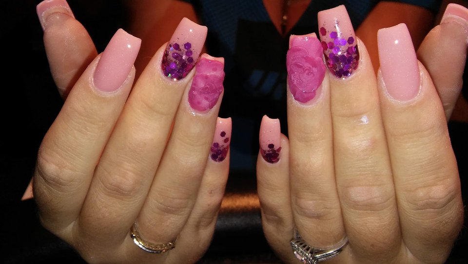 Clean salon stations with manicure tools.